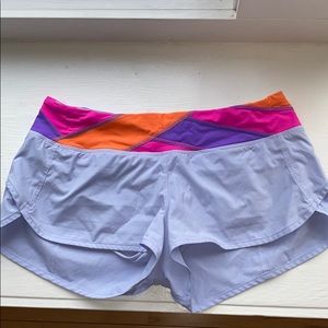 Light purple lululemon workout shorts